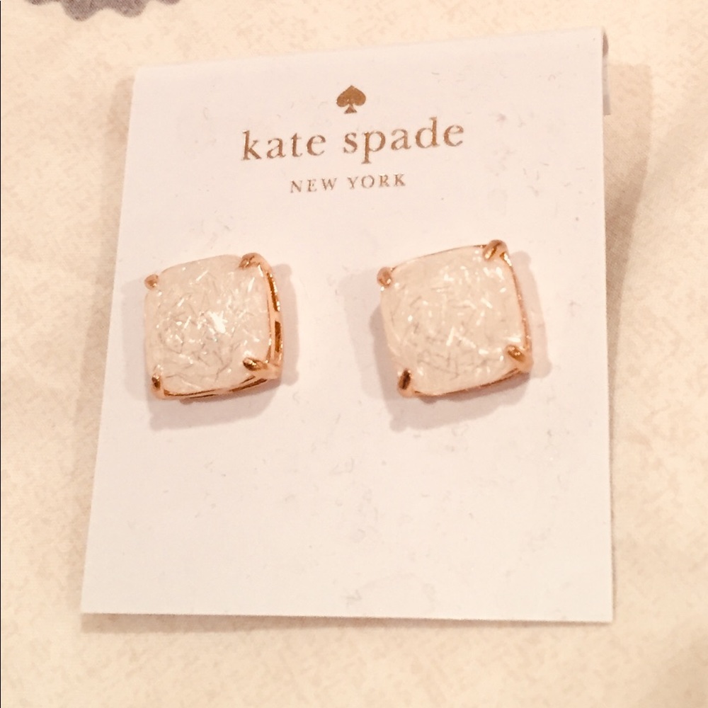 Kate Spade Sparkle post earrings in gold tone.